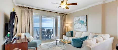 Living room with balcony access.