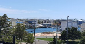View from house of the Bay, just steps away can see the Harvey Cedars Marina.
