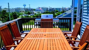 Upstairs Front Deck - dining table and chairs for upto 8 persons