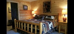 King log bedroom suite , wood gas stove fireplace, lakefront views and full bath