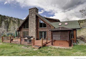 Deck with grill, fire pit, seating, gazebo and hot tub