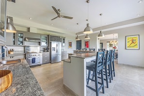 Huge Commercial Kitchen with dishwasher, bar seating for 6, ice maker, and A/C
