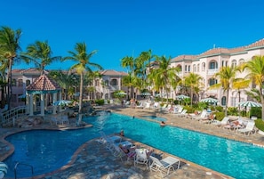 THE NORTH POOL IS SURROUNDED BY MAJESTIC KING PALMS & LARGE 8 PERSON JACUZZI.