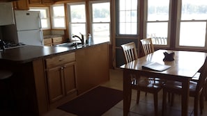 The Kitchen and dining area also have a great view of the lake.