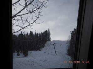 Looking out the skylight in our living room at ski slopes and lift 7
