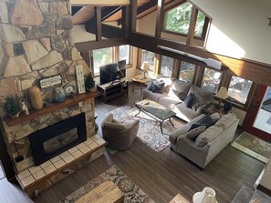 2nd Floor balcony view.  2 living spaces. Gas fireplace, 58in smart, Youtube TV.