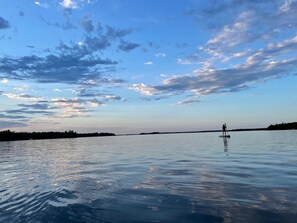 Morning sunrise on a paddle board.