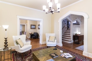 Partial view of Livingroom with peek into front hall and a bit of dining room.
