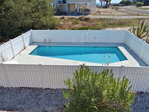 Private pool view from your expansive screened living area!