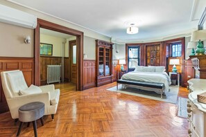 Modern meets Traditional in this Brownstone bedroom. 