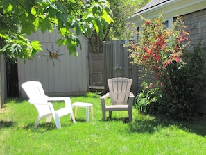 Private side yard with back shed and outdoor shower