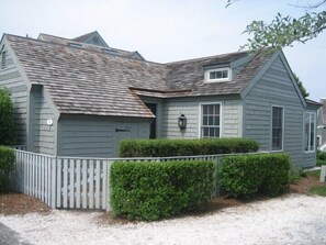Nantucket style condo, exterior and entrance with adjacent parking space