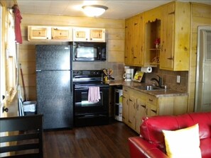 Fully stocked kitchen with all new applianes, dishes, etc.