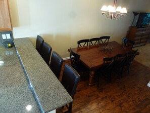 Table expands to seat 12, with movable benches for everyone to dine together