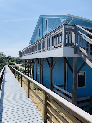 Side of house and boardwalk