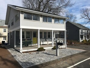 Outside dining on porch & outside shower on left side with hot & cold water.