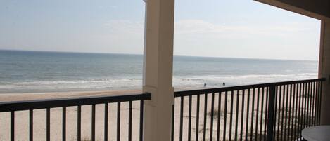 View from the balcony, kitchen, living room and master bedroom