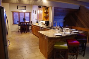 Fully Stocked Kitchen with heated floor!
