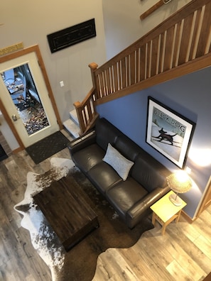 Main floor living room - watch the skiers go by from your warm couch!