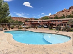 Make a splash! Our guests have access to this sparkling pool, soothing hot tub, and an on-site gym to enhance your vacation stay.