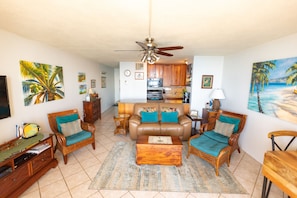 air conditioning, living room and kitchen with entry door in background