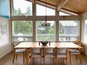 Large & bright dining room.  Seats up to 10.  There is also a high chair.