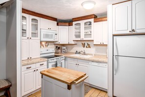 Bright kitchen with microwave, coffee maker, anything you could need