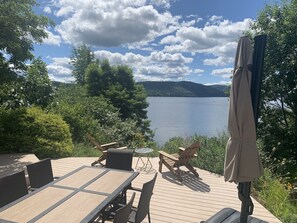 Large Deck.  Outdoor dining, lounging and fire table.