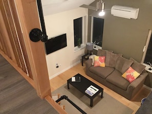 Looking down from loft into sitting/living area