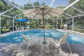 Your Private Pool in Lush Landscaping Visible from All the Common Areas Awaits!