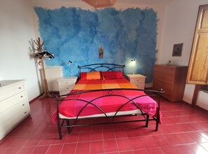 our colorful bedroom overlooking the sea