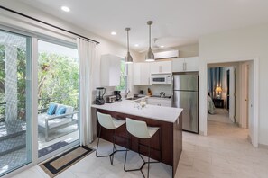 Expansive Kitchen and Dining Area that Extends to the Outdoor Patio