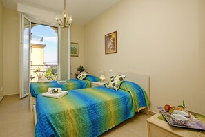 Second bedroom leading onto the balcony