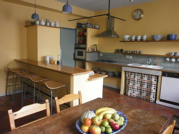 Bright and very spacious kitchen, perfect for cooking and eating altogether.