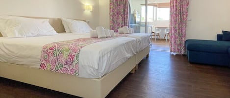 The Studio consists of twin beds, 1 sofa bed, with air conditioning, wardrobe, private bathroom, kitchenette and a balcony 