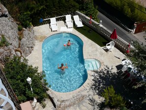 Pool is equipped with massage jet at one end