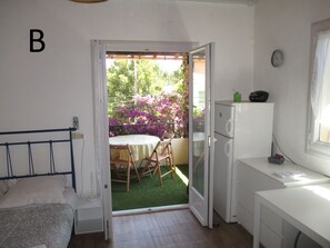 Appartement B chambre 1 et terrasse