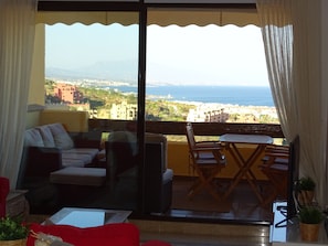 view from the sofa to the terrace and the see