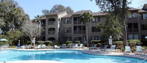 Large pool with lounge seating and hot tub!