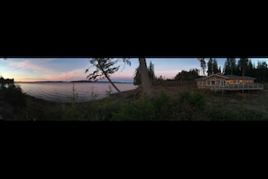 Panorama of house taken by one of my guests!  Jacuzzi on deck along w BBQ/relax!