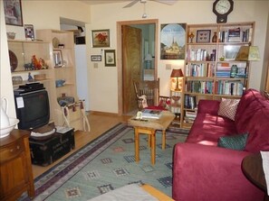 living room beautifully decorated with many books to read while visiting