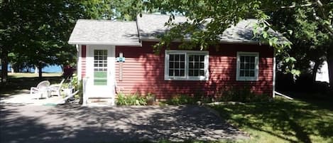 front view of cottage- you can see Green Bay in the background
