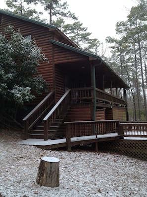 covered porch and separate hot tub deck overlook hilltop wooded views
