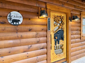 Front Entrance with Beautiful Hand Carved Bear Door