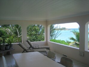 Veranda view south with chaise lounges