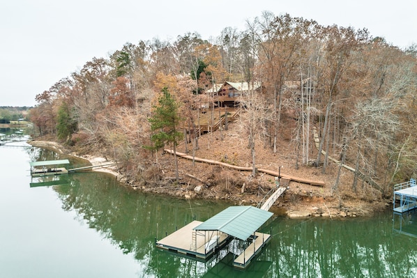view of private dock and walkway from house