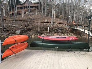 Canoe, paddle board, and 2 kayaks