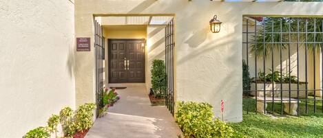 majestic entrance  with sitting   fenced sitting area