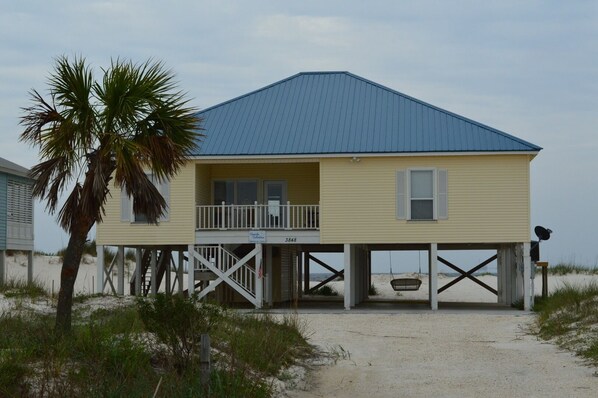 front of house, gulf seen out back