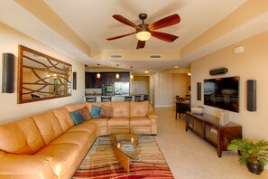 Comfortable living area with HD television (there are three HD TV's in the condo